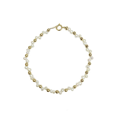 Pulsera Dorada con Bolsita Tejida de Perlas Naturales y Diseño Estelar