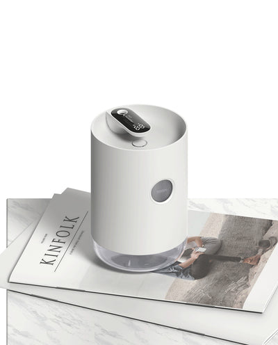 White cylindrical humidifier with a transparent base, digital display, and 1000ml capacity indicator. - Image 8