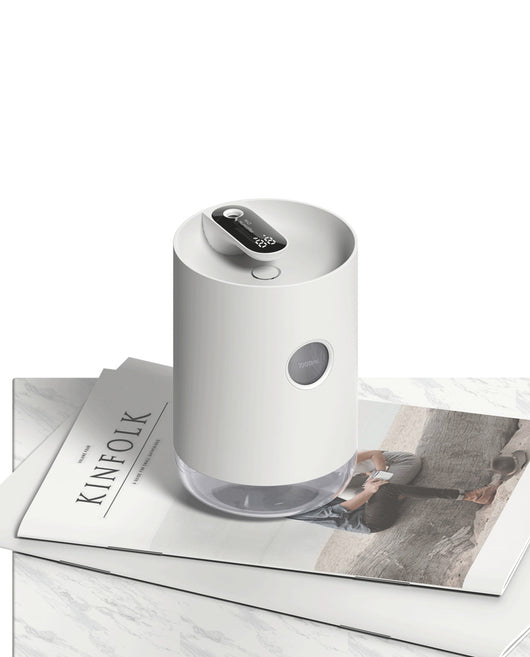 White cylindrical humidifier with a transparent base, digital display, and 1000ml capacity indicator. - Image 8