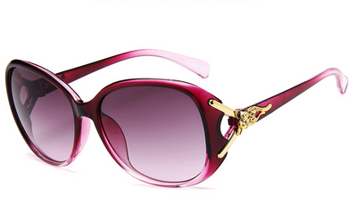 Brown oversized women's sunglasses with gradient lenses and gold-tone fox head embellishments on the temples. - Image 3