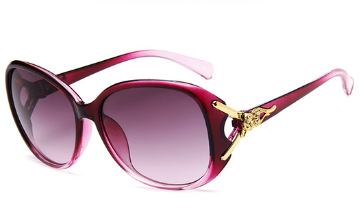 Brown oversized women's sunglasses with gradient lenses and gold-tone fox head embellishments on the temples. - Image 3