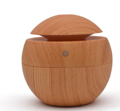 Black spherical ultrasonic atomizer with a power button icon, designed for aromatherapy and humidification. - Image 8