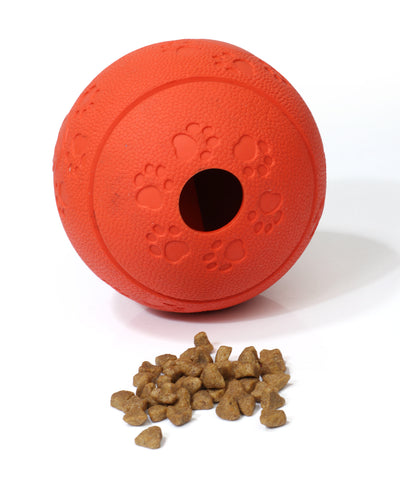 Red TPR dog leaking food ball with paw print patterns and a treat dispensing hole. - Image 4