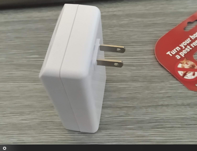 White electronic mouse repeller with a European standard two-pin plug, designed for wall outlet use. - Image 5