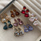 Aretes Colgantes con Detalles de Cristales Brillantes