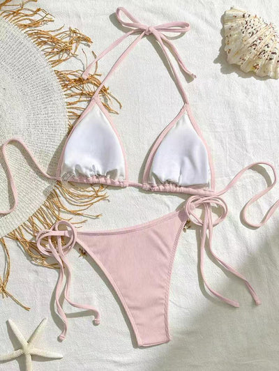 Light pink ribbed halterneck bikini with triangle cups and tie-side bottom, adorned with shell and starfish charms. - Image 18