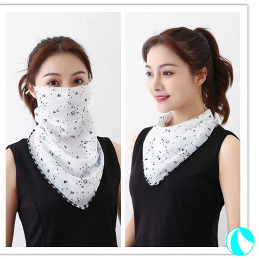 White women's UV protection scarf with black speckle pattern, worn as a face mask and neck scarf. - Image 20