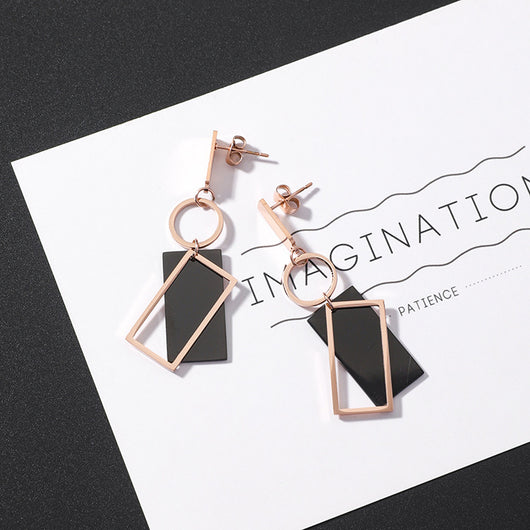 Aretes de Acero Titanio Geométricos con Borlas - Diseño Moderno y Versátil - Image 5