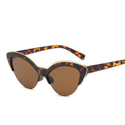 Purple cat-eye sunglasses with translucent frames and purple lenses, featuring a silver-tone accent.