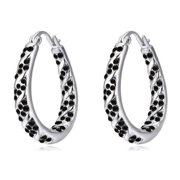 Aretes Ovalados de Cristal y Diamante - Image 12
