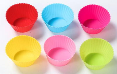 Six colorful silicone cupcake liners in red, blue, hot pink, yellow, pink, and lime green on a white background. - Image 11