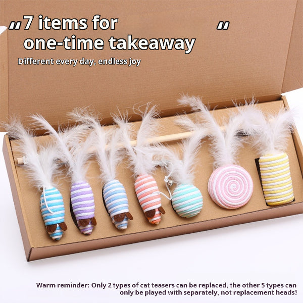7-piece cat toy gift set with mouse, feather wands, and string-wrapped toys in a brown cardboard box.