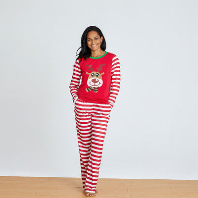 Young boy wearing a red and white striped long-sleeved pajama set with a reindeer graphic on the chest. - Image 13
