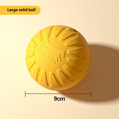 Yellow 7cm solid EVA dog toy ball with textured surface and dog silhouette graphic. - Image 7