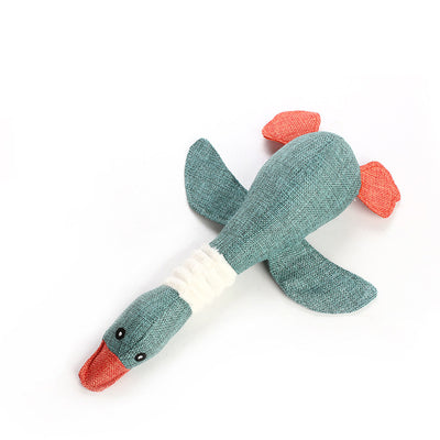 Plush teal duck dog toy with orange beak and feet, and a white ribbed neck, designed for sounding and puzzling. - Image 28