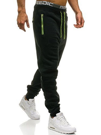Pantalones deportivos casuales con detalles de costura y cierre - Image 2