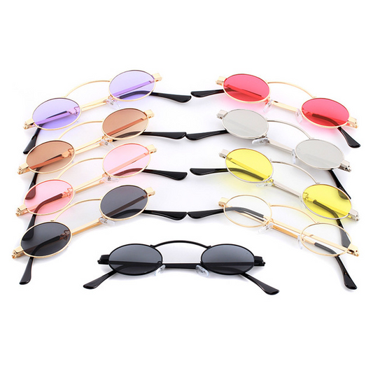 Fashionable small frame round sunglasses with black metal frames and dark grey lenses on a white background.
