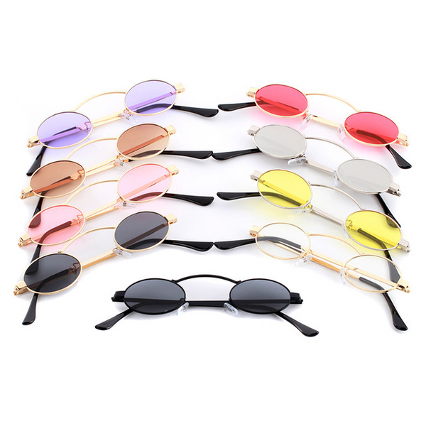 Fashionable small frame round sunglasses with black metal frames and dark grey lenses on a white background.