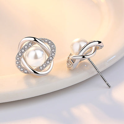 Aretes de Perla Concha con Giro Elegante - Image 3