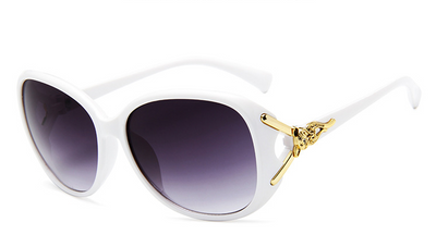 Brown oversized women's sunglasses with gradient lenses and gold-tone fox head embellishments on the temples. - Image 9