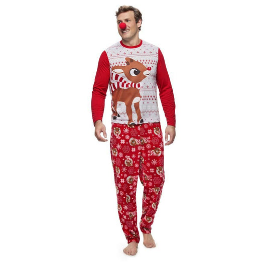 Family of five wearing matching red and white Christmas pajamas with reindeer and snowflake patterns. - Image 4