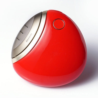 White egg-shaped electric nail clippers trimmer with a gold-toned accent and a single control button. - Image 13