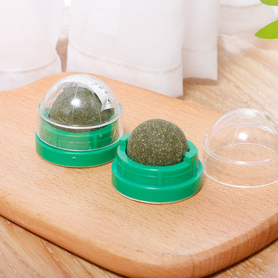 Two catnip licking balls, one in a blue plastic base and one in a green plastic base, on a white background. - Image 5
