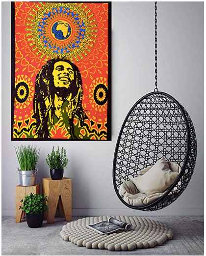 Vibrant Bob Marley tapestry with dreadlocks, a smiling face, and a colorful mandala globe design on a red background.