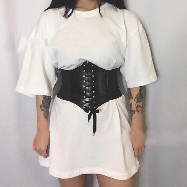 Red wide waist belt with a lace-up front design and elasticated sides, perfect for cinching the waist.