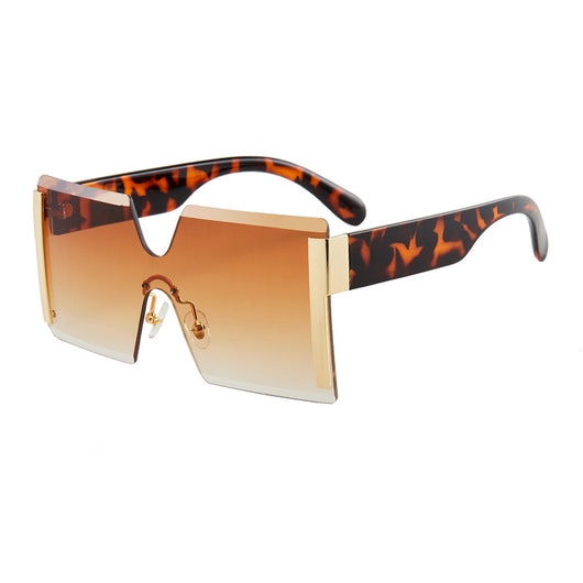 Frameless sunglasses with pink gradient lenses, black temples, and gold-tone accents on a white background. - Image 14