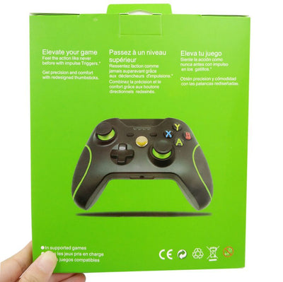 Black wired USB game controller with green accents, two joysticks, and ABXY buttons, shown with USB, USB-C, and micro-USB adapters. - Image 5