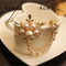Pearl flower brooch Dorado