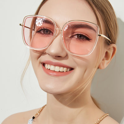 Big square sunglasses for women with transparent pink frames and pink gradient lenses, featuring gold-tone metal temples. - Image 4