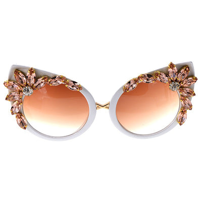White cat-eye sunglasses with brown gradient lenses, adorned with clear and amber rhinestone flowers and bees. - Image 3