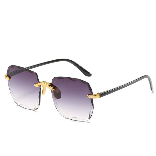 Pink rimless square sunglasses with wavy edges, gold-tone hardware, and clear pink temples on a white background.