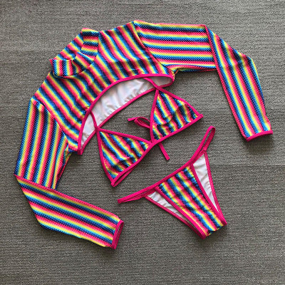 Three-piece rainbow striped bikini suit with triangle top, thong bottom, and long-sleeved cropped cover-up. - Image 3