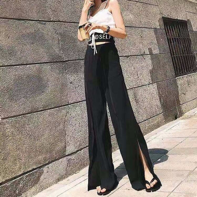 Pantalones negros de cintura alta con abertura lateral - Image 3