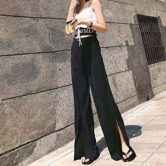 Pantalones negros de cintura alta con abertura lateral - Image 3