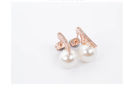 Rose gold-toned necklace and drop earrings set with white spherical pearls and clear rhinestone accents. - Image 4