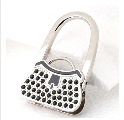Organizador de Bolsos y Carteras con Ganchos de Cristal - Soporte Plegable Portátil - Image 7