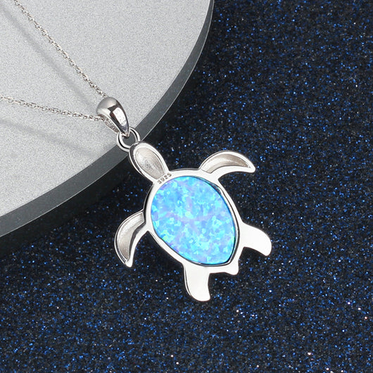 Collar Colgante de Tortuga con Flor Azul en Resina Epoxi para Mujer - Image 4