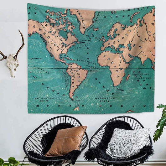 Vintage-style world map tapestry with ocean currents in teal and peach, hanging on a white brick wall. - Image 3