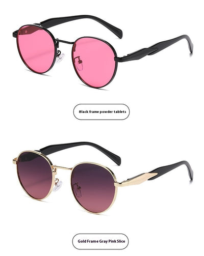 Silver metal round frame sunglasses with dark grey lenses and black temples, offering UV protection for women. - Image 21