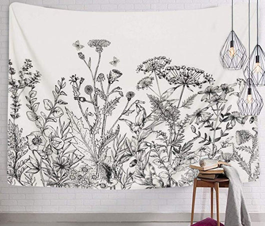 White tapestry with a black and white botanical print of wildflowers and butterflies, perfect for home decor.