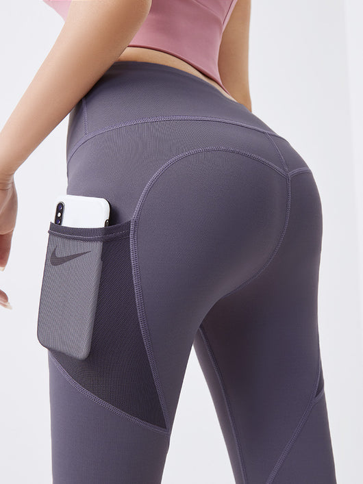 Pantalones fitness ajustados con bolsillos de malla lateral - Image 2