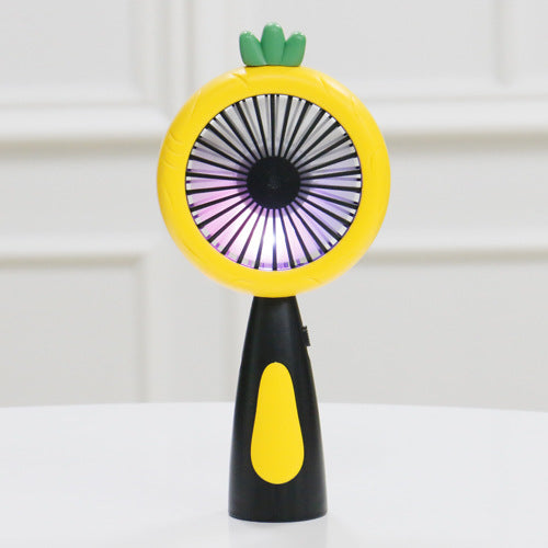 White and lime green children's handheld fan with a round head, small leaf accent, and fruit-like design. - Image 8
