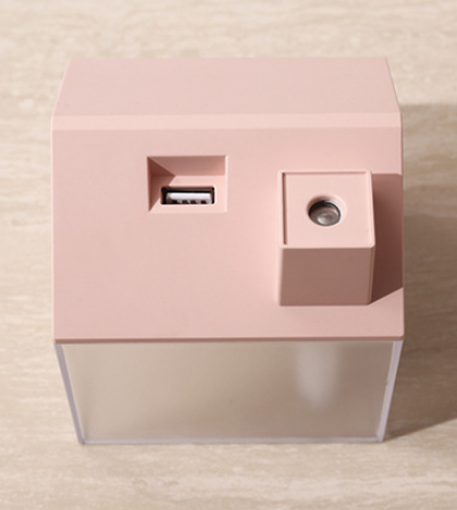 Two house-shaped USB humidifiers, one dark gray and one pink, with clear bases showing H₂O text. - Image 5