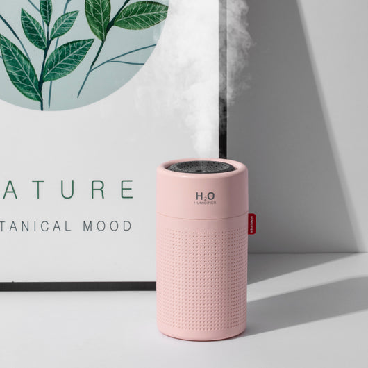 White cylindrical USB rechargeable wireless ultrasonic aromatherapy water mist diffuser lamp with H₂O HUMIDIFIER text. - Image 2