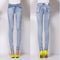 Calça skinny justa e rasgada