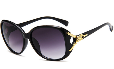 Brown oversized women's sunglasses with gradient lenses and gold-tone fox head embellishments on the temples. - Image 6